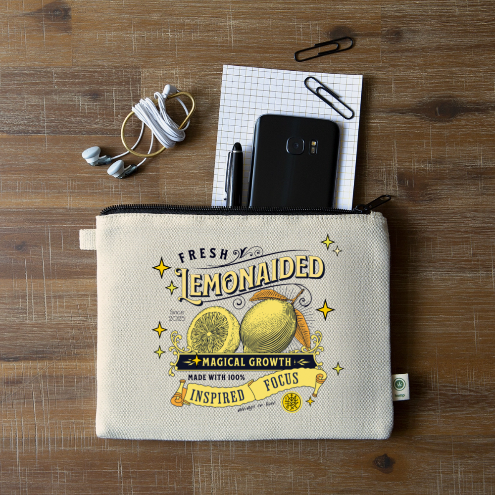 Flat lay hemp carry all or makeup pouch with Lemonaided Magic custom sigil artwork — Mercury Loves Osiris collection